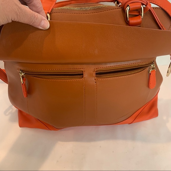 Orange handbag with a rust color body of bag and orange accent shoulder strap - Picture 6 of 16